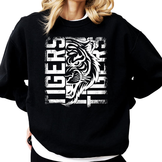 Model wearing Tigers team spirit sweatshirt showing unisex fit and sizing