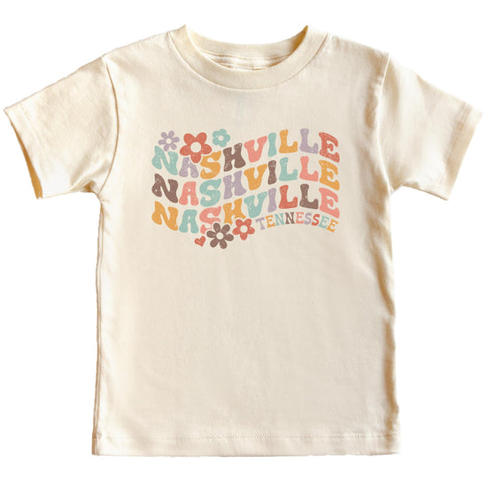Close-up of Nashville Tennessee groovy print with flower accents on natural shirt