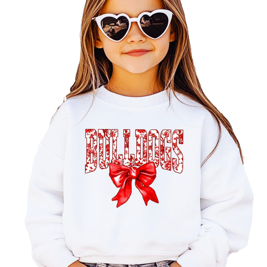 Bulldogs school spirit sweatshirt with red bow design on black fabric