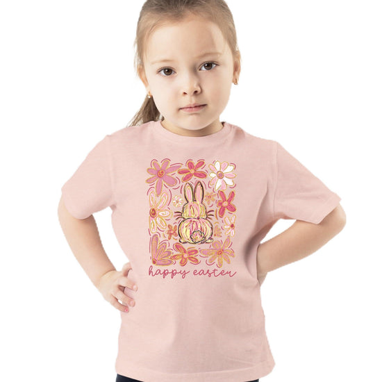 Close-up of vibrant floral bunny print on peach Easter t-shirt — Olive Loves Apple graphic apparel
