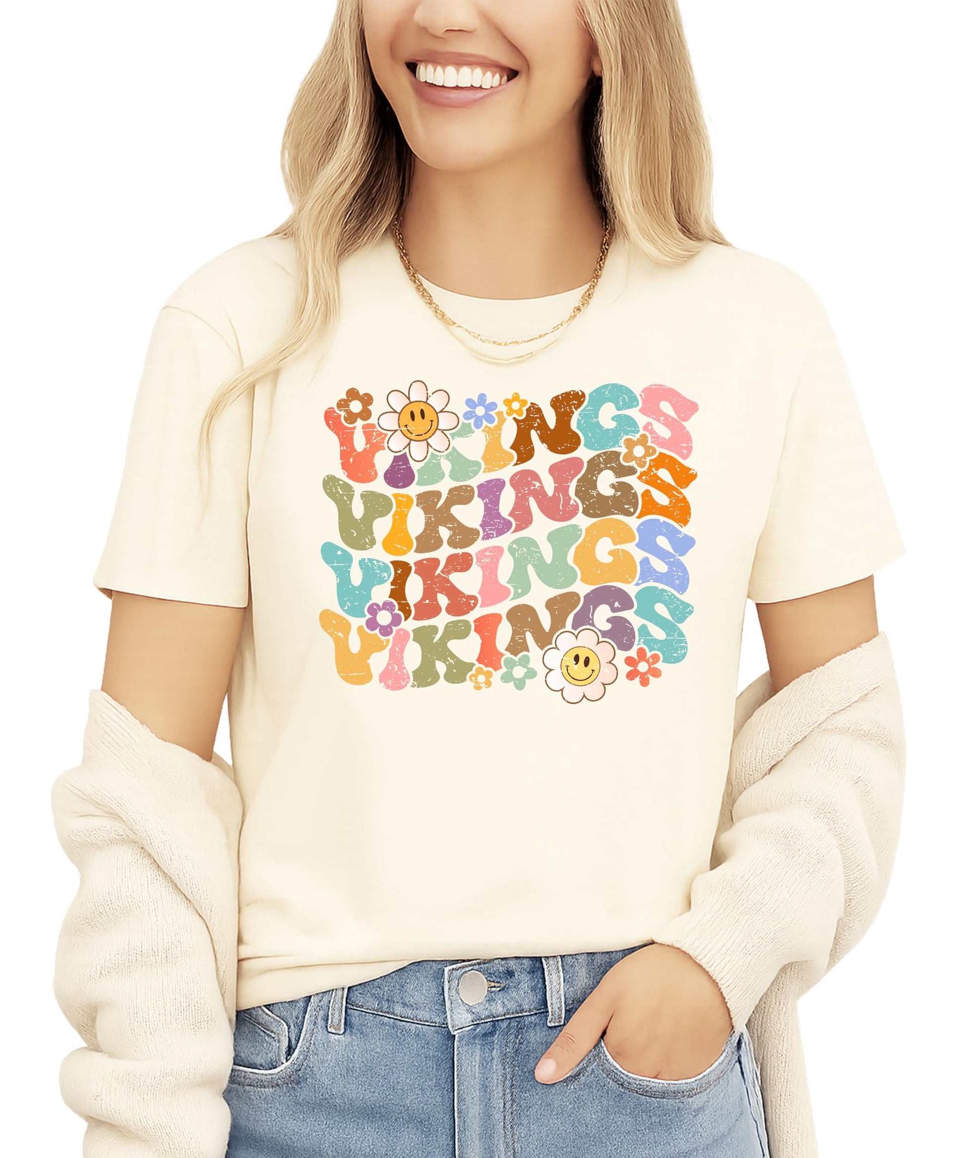 Vikings team spirit shirt flat lay displaying full groovy rainbow letter design