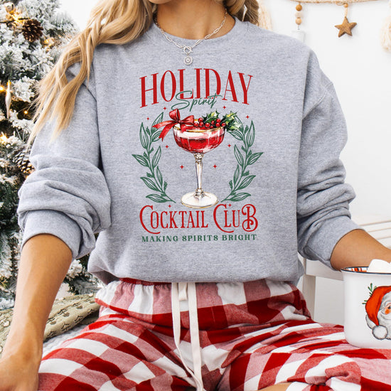 Front view of gray Holiday Spirit Cocktail Club women's Christmas graphic sweatshirt