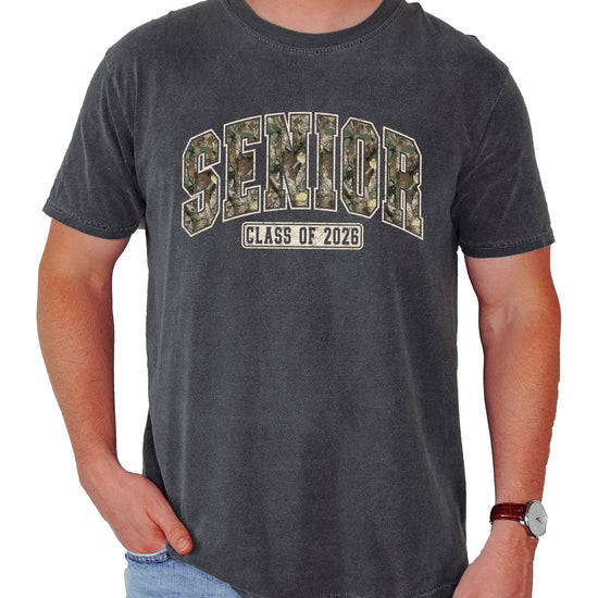Detail shot of Class of 2026 badge graphic on camouflage-style unisex shirt