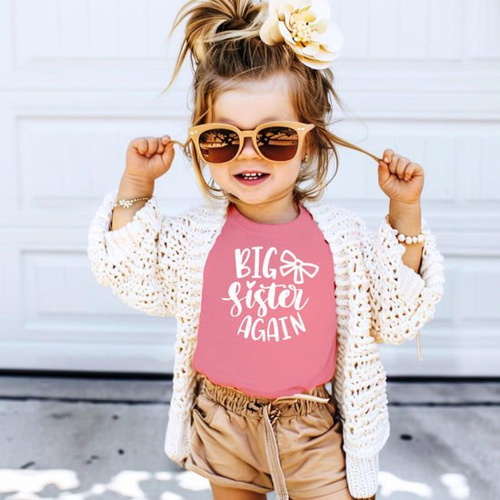 Olive Loves Apple Big Sister Again bow shirt styled for pregnancy announcement photo