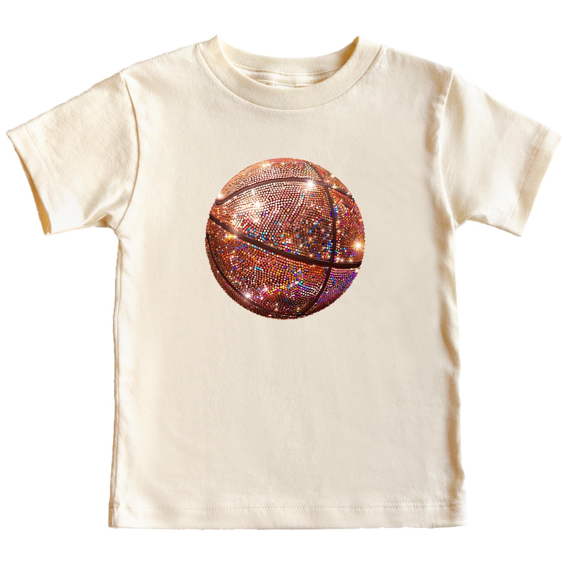Young girl modeling a girly pink basketball tee with faux glitter graphic detail