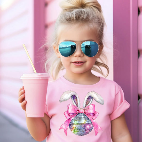 Olive Loves Apple pink disco bunny Easter shirt for girls displayed on hanger or styled flat