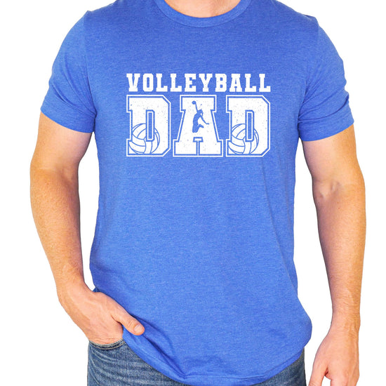 Close-up view of volleyball dad distressed graphic design on red shirt