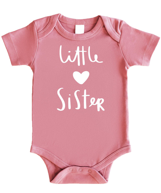 Little Sister heart bodysuit styled for a sibling reveal or pregnancy announcement photo