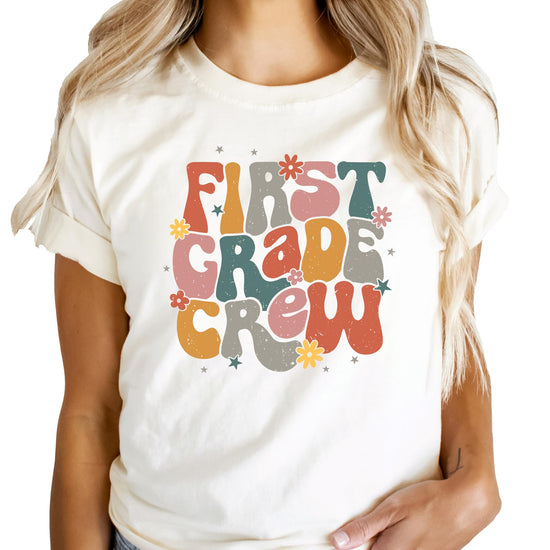 First Grade Crew girls' graphic tee laid flat showing full front design
