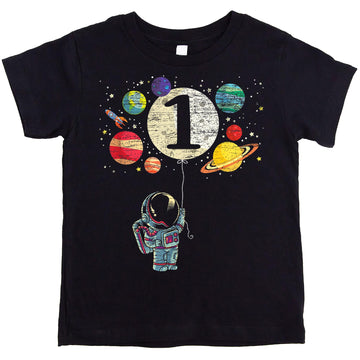 Toddler wearing 1st birthday rocket astronaut space shirt in vintage royal blue for boys and girls