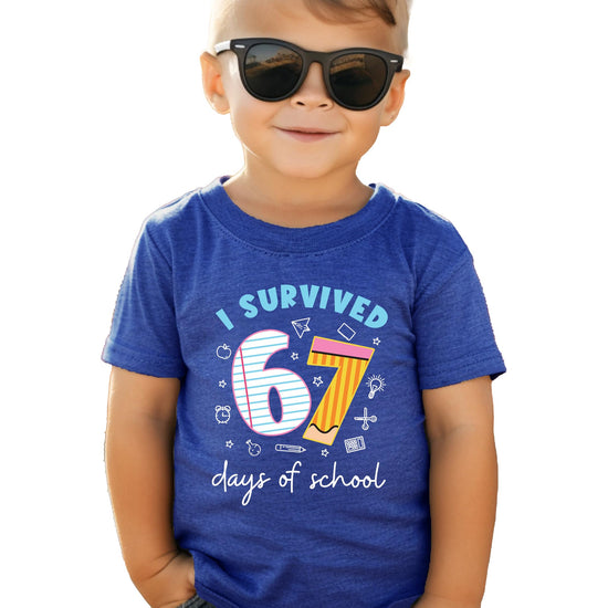 Kids funny graphic tee with 'I Survived 67 Days of School' vintage-style paper and pencil design