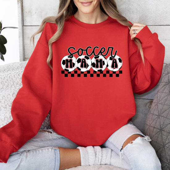 Olive Loves Apple Soccer Mama sweatshirt detail showing bold graphic print and fabric texture