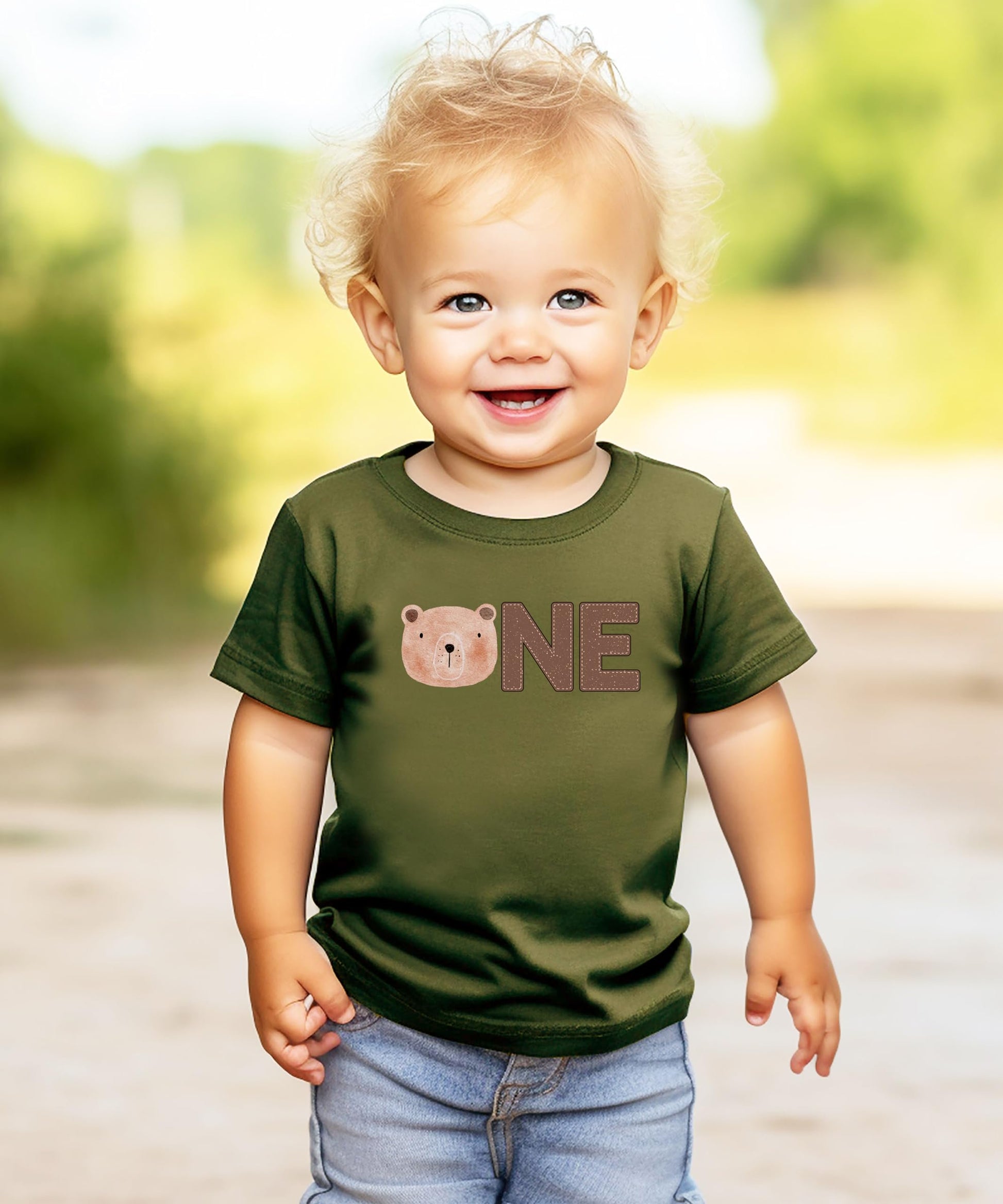 Detail shot of high-quality bear face ONE print on boys 1st birthday shirt