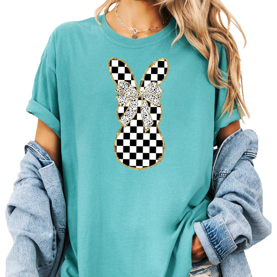 Back view of woman in checkered Easter bunny t-shirt