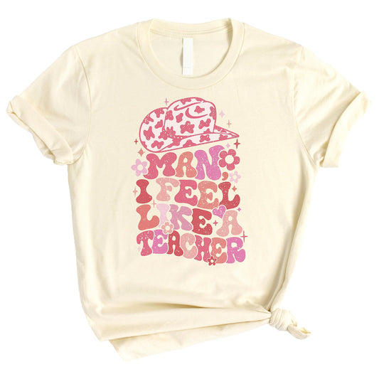 Natural colored graphic tee with 'Man I Feel Like a Teacher' cowgirl western design for teachers