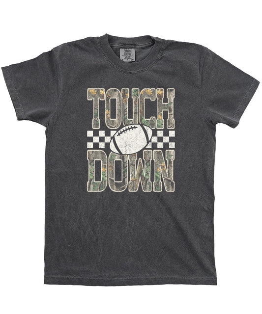 Unisex camo football tee laid flat showing full graphic design on garment-dyed Comfort Colors shirt