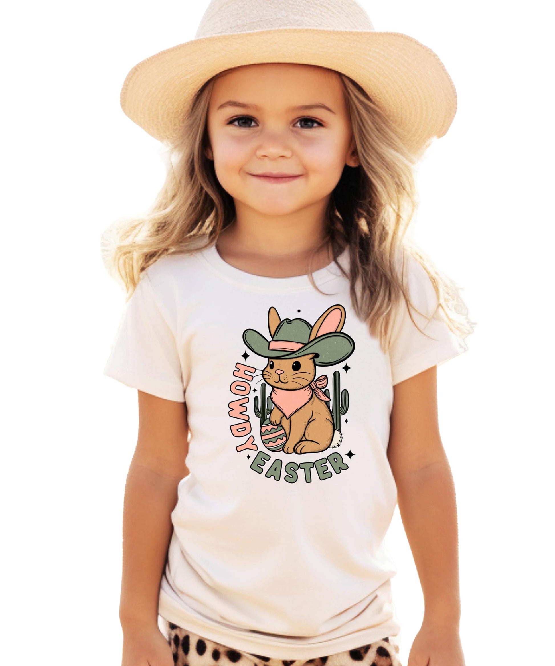 Close-up of Howdy Easter desert bunny graphic print on girls' peach youth tee