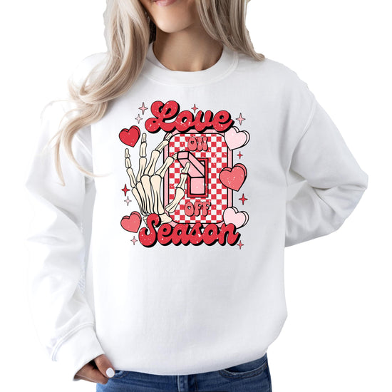 Close-up of Love Season Valentine's Day graphic print on cozy unisex sweatshirt