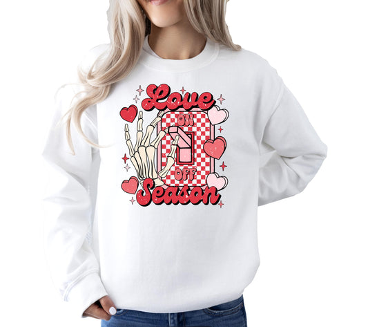 Close-up of Love Season Valentine's Day graphic print on cozy unisex sweatshirt