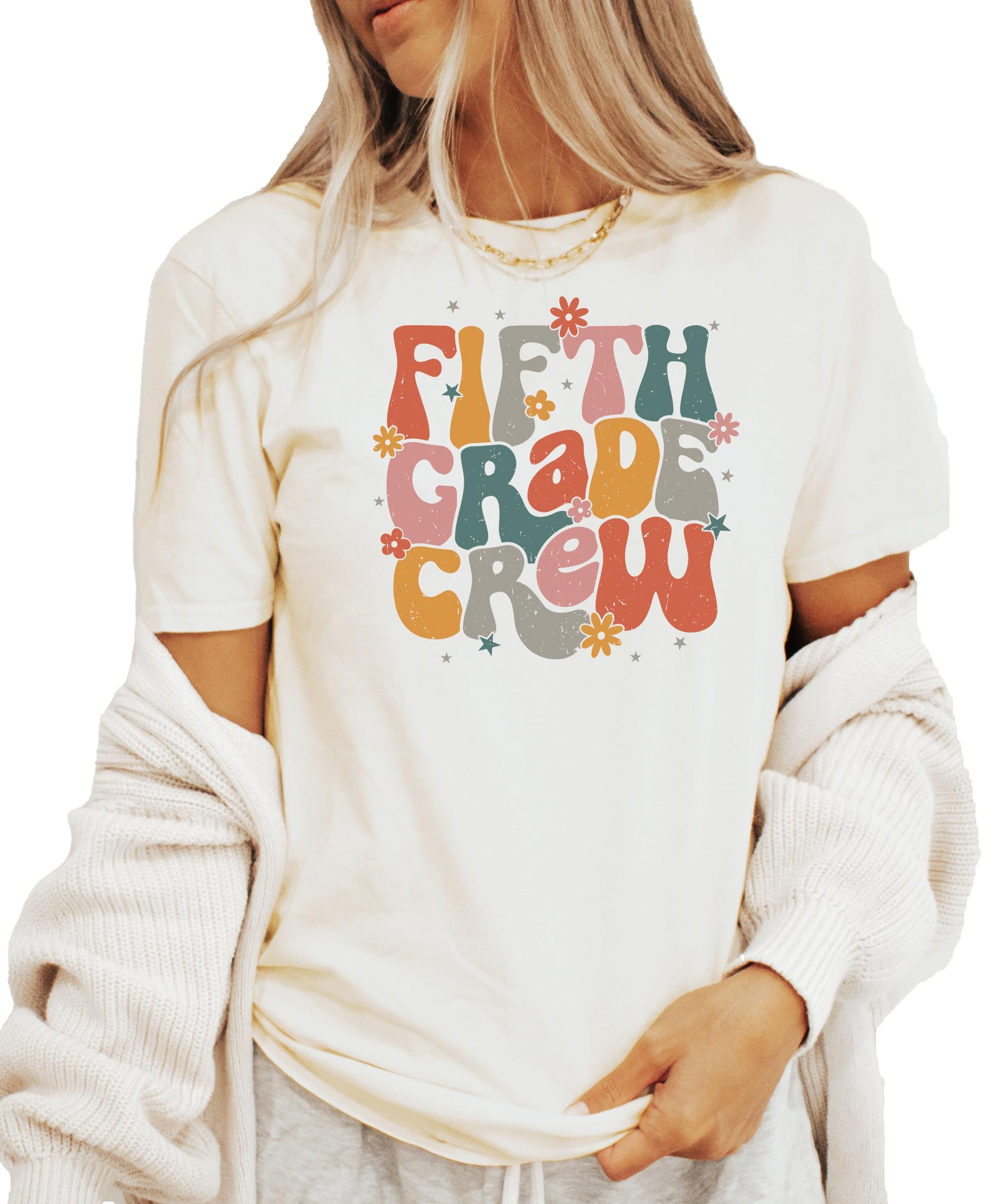 Close-up of second grade vintage text design on peach colored t-shirt