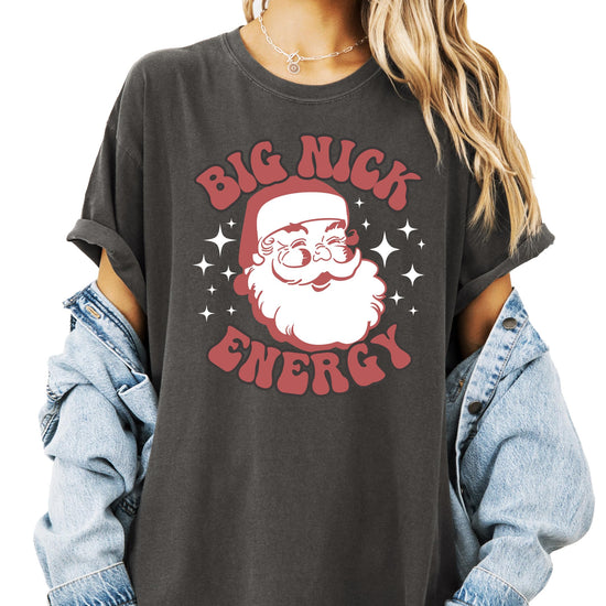 Women modeling Big Nick Energy Christmas shirt, casual holiday style