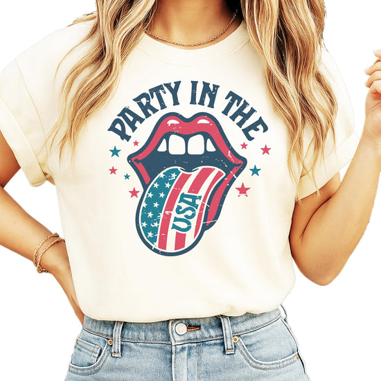 Party in the USA graphic tee with red tongue and stars design on ivory shirt