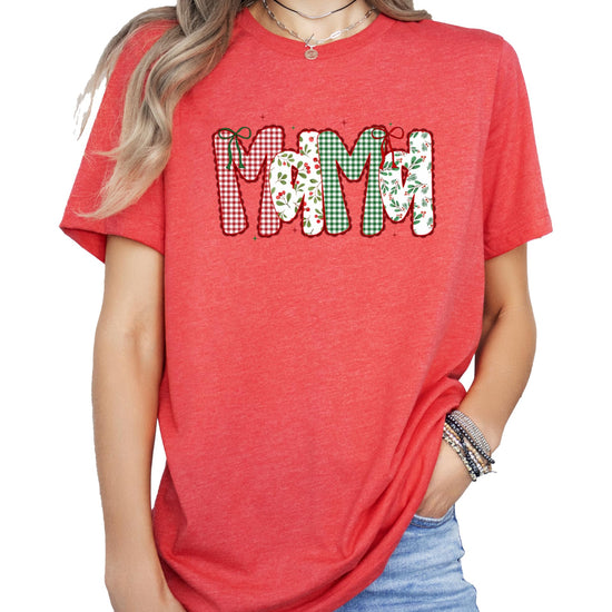 Family matching Christmas shirts for Mama Mimi Gigi and Nana laid flat showing festive print