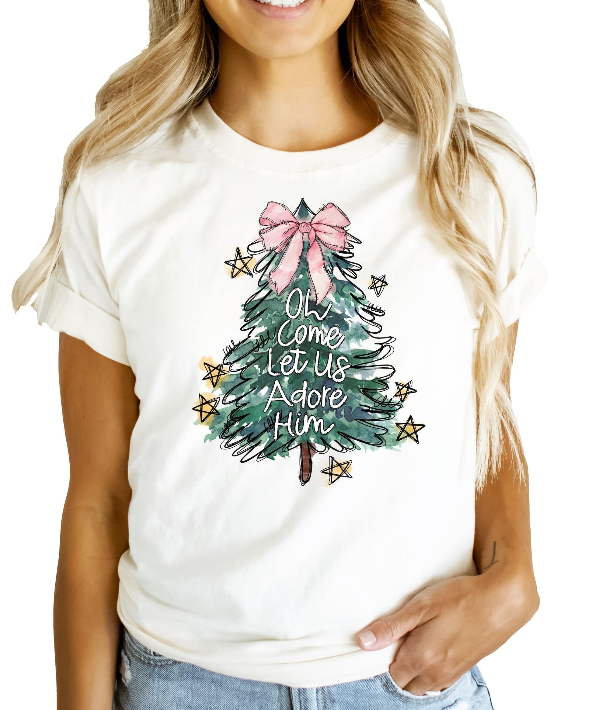 Detailed graphic of illustrated Christmas tree with pink bow on girls holiday tee