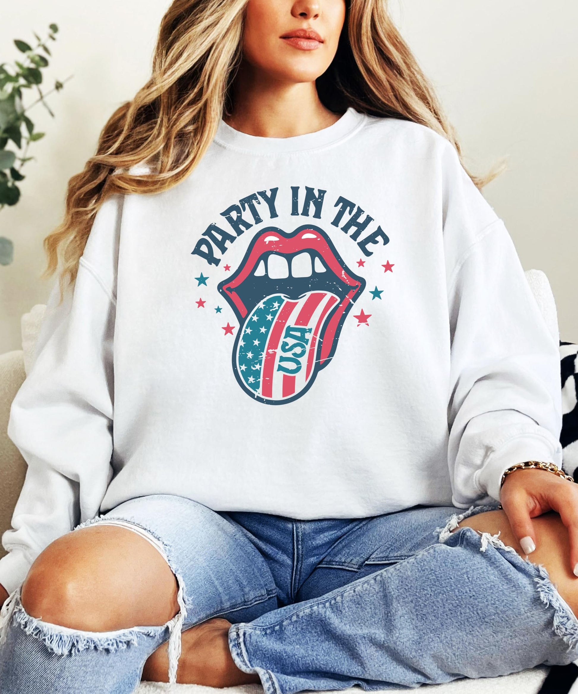 Olive Loves Apple Party In The USA white sweatshirt styled for Fourth of July or summer concert outfit