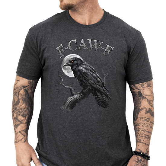 Man wearing black sarcastic crow graphic tee shirt front view