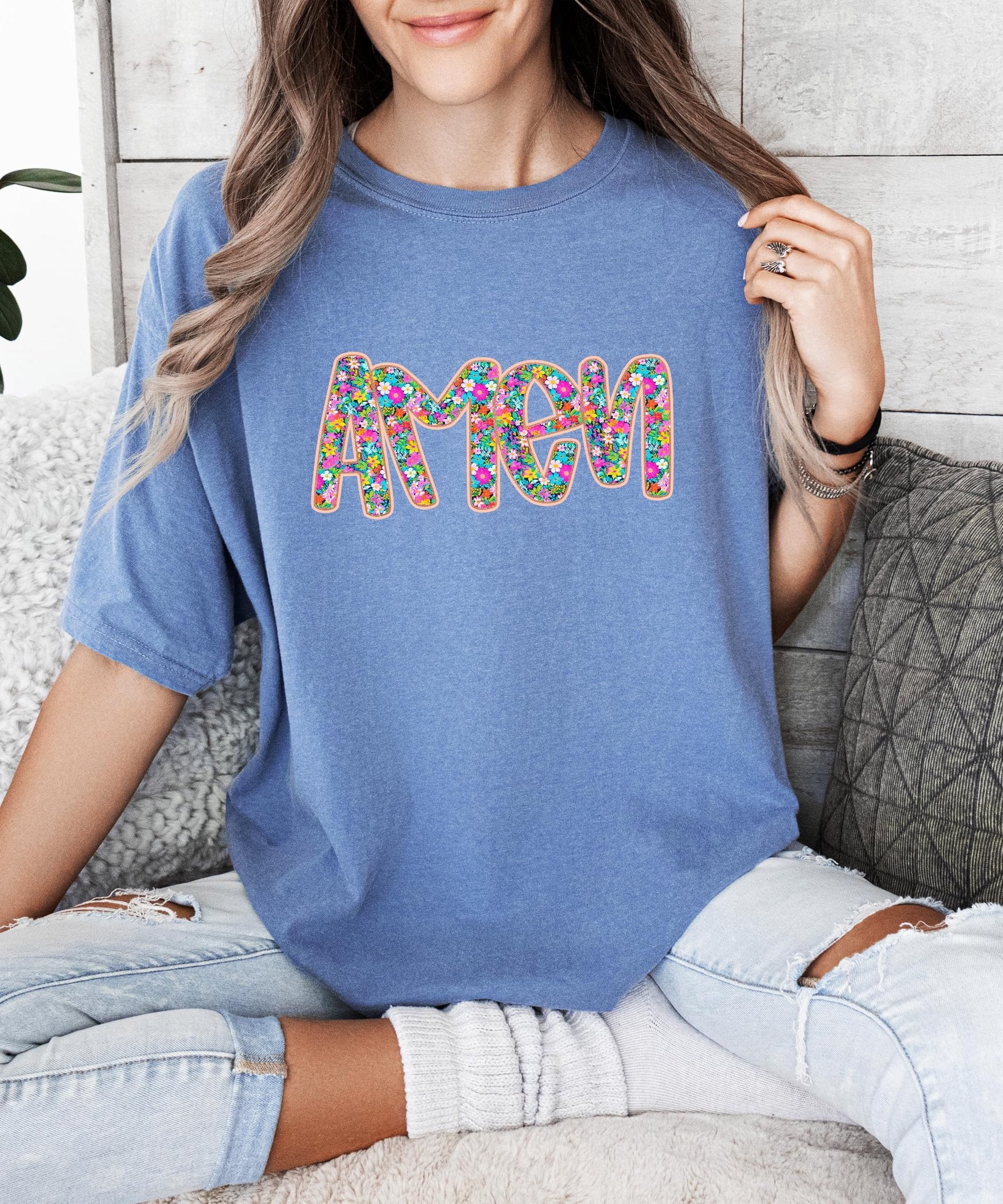 Women's Christian Amen graphic tee styled casually, colorful floral design perfect for church or everyday wear