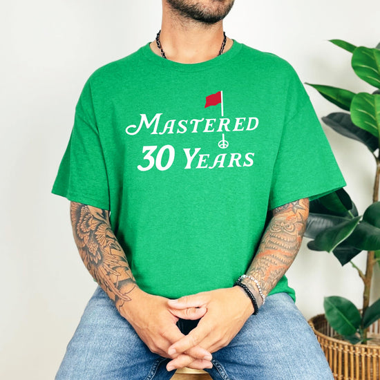 Lifestyle photo of Mastered 30 Years funny golf birthday shirt worn by adult model