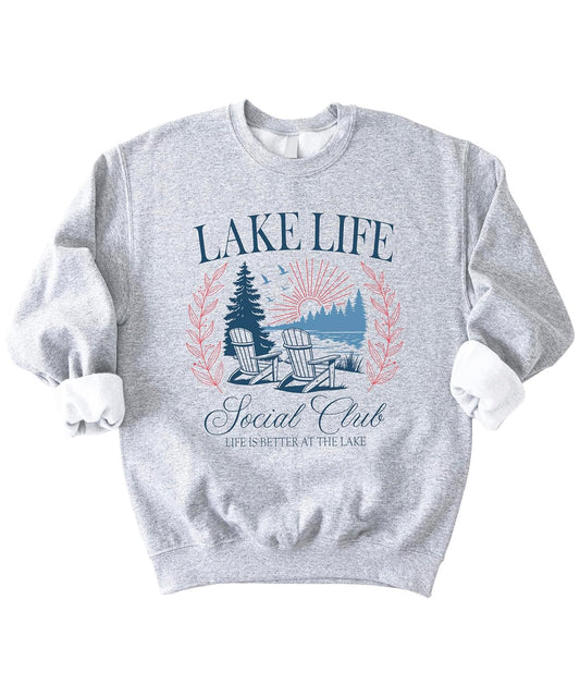 White Lake Life Social Club sweatshirt with vintage lakeside scene design featuring Adirondack chairs and pine trees