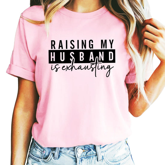 Lifestyle view of women's casual funny graphic tee with husband humor saying