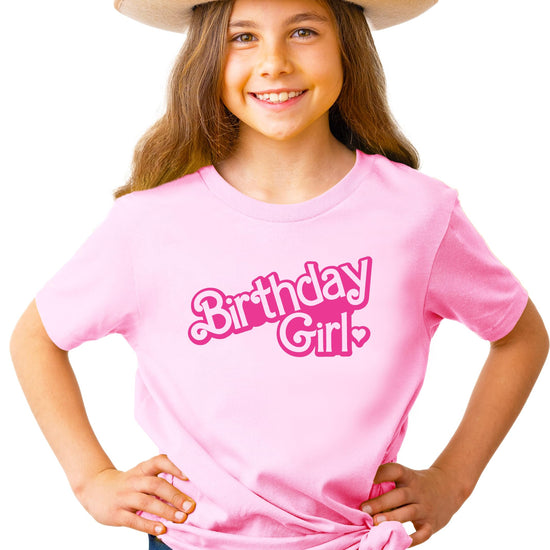 Flat lay of purple birthday girl doll graphic shirt for toddlers and kids