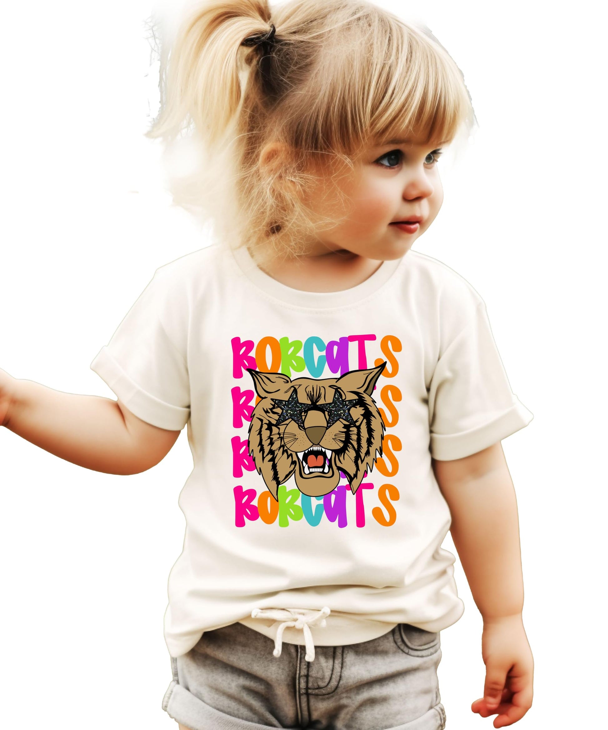 Front view of Bobcats spirit tee featuring vibrant wavy text and bold bobcat mascot graphic
