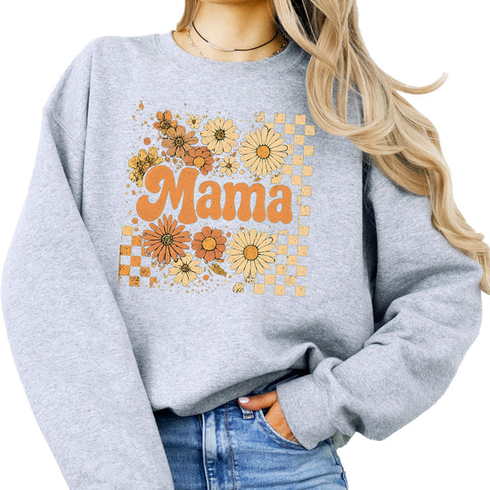 Model wearing black mama checkered floral sweatshirt styled for casual fall outfit