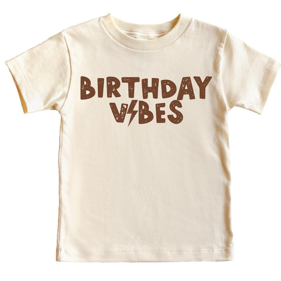 Close-up of Birthday Vibes bolt graphic print on boys birthday shirt in royal blue