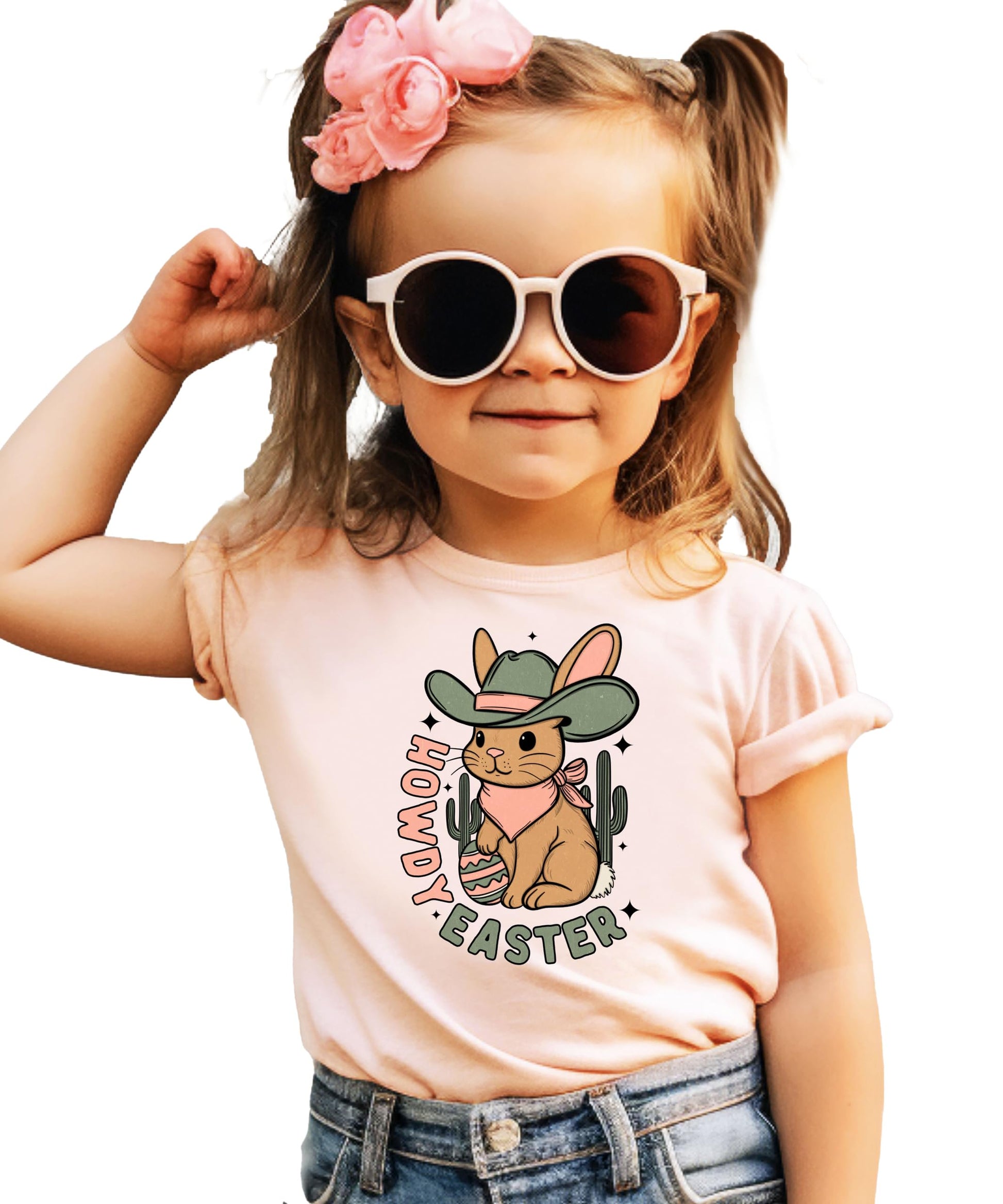 Detail shot of Howdy Easter graphic tee print quality on soft peach girls' youth shirt