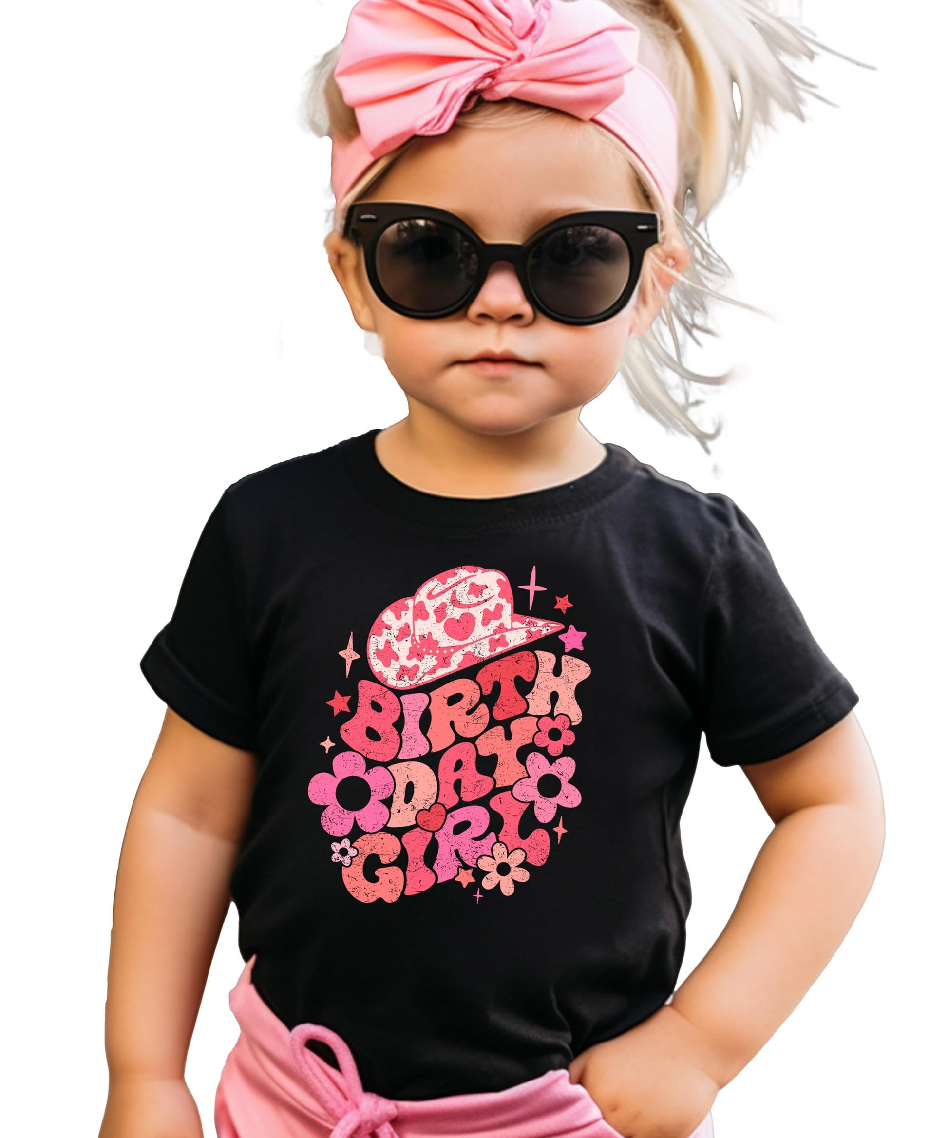 Little girl wearing groovy cowgirl birthday outfit natural graphic tee