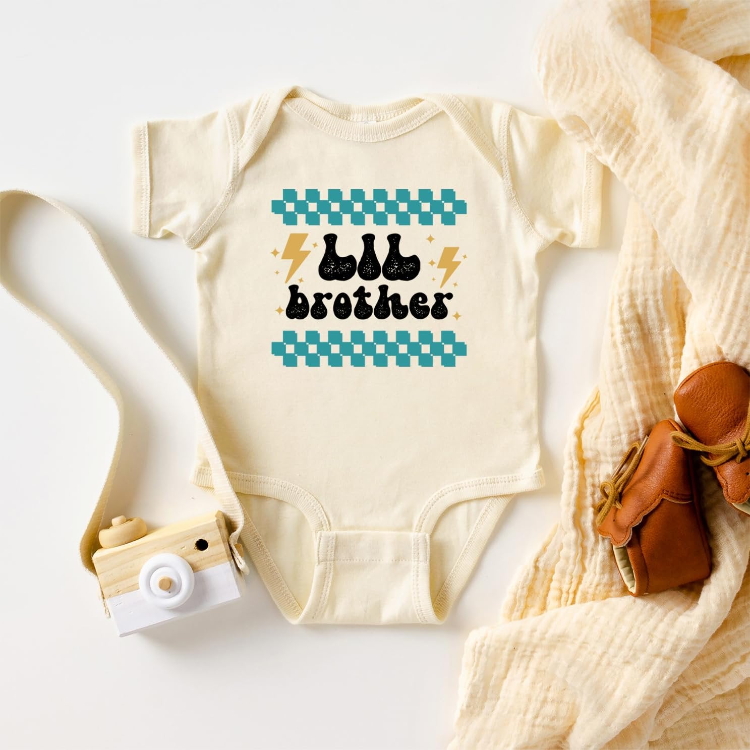 Little brother retro lightning outfit styled for baby announcement photo