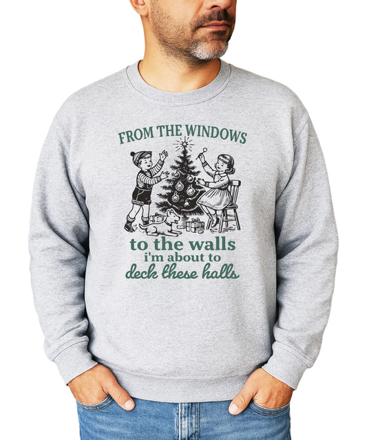 Close-up of Deck These Halls holiday graphic sweatshirt showing vibrant print detail on gray fabric