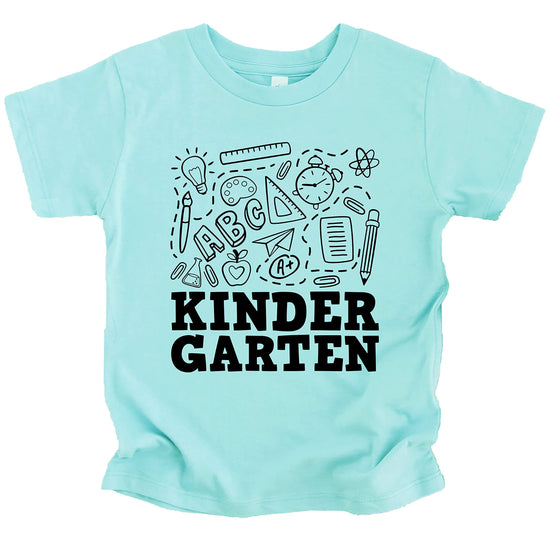Close-up of kindergarten back to school graphic print on pink kids shirt