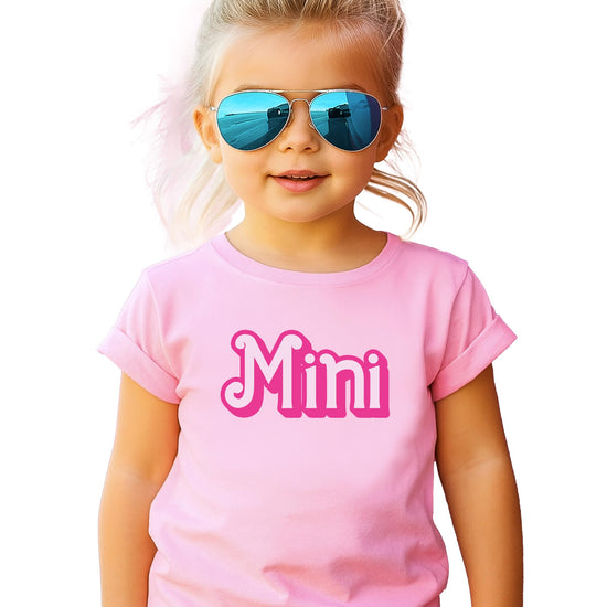 Mama and mini matching pink graphic tees with playful bubbly font for mom and daughter