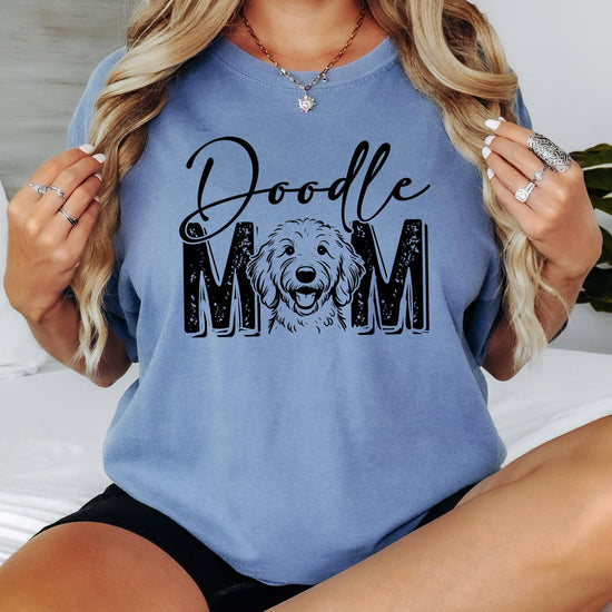 Styled flat lay of Goldendoodle dog mom graphic tee perfect for gifting