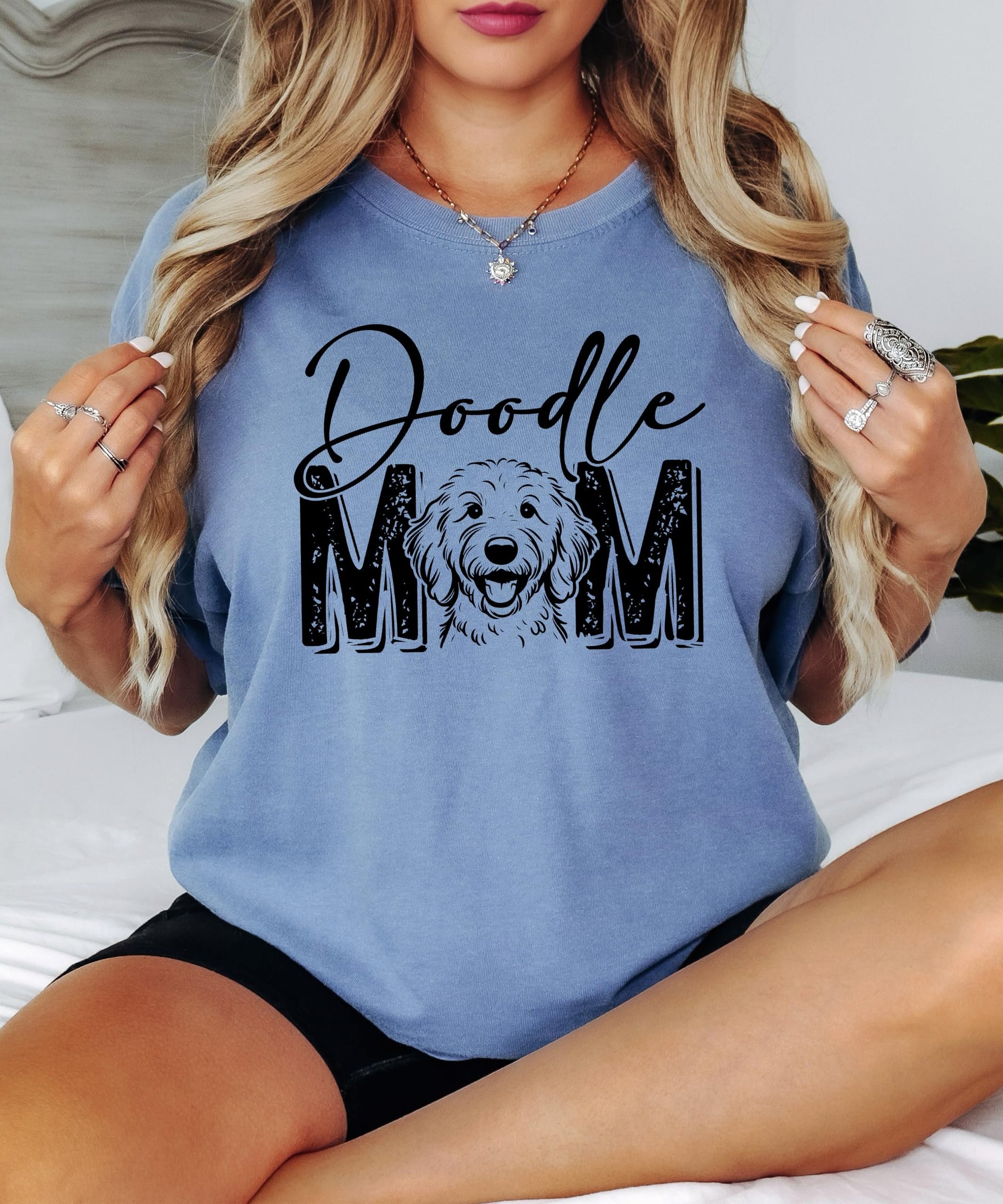 Styled flat lay of Goldendoodle dog mom graphic tee perfect for gifting