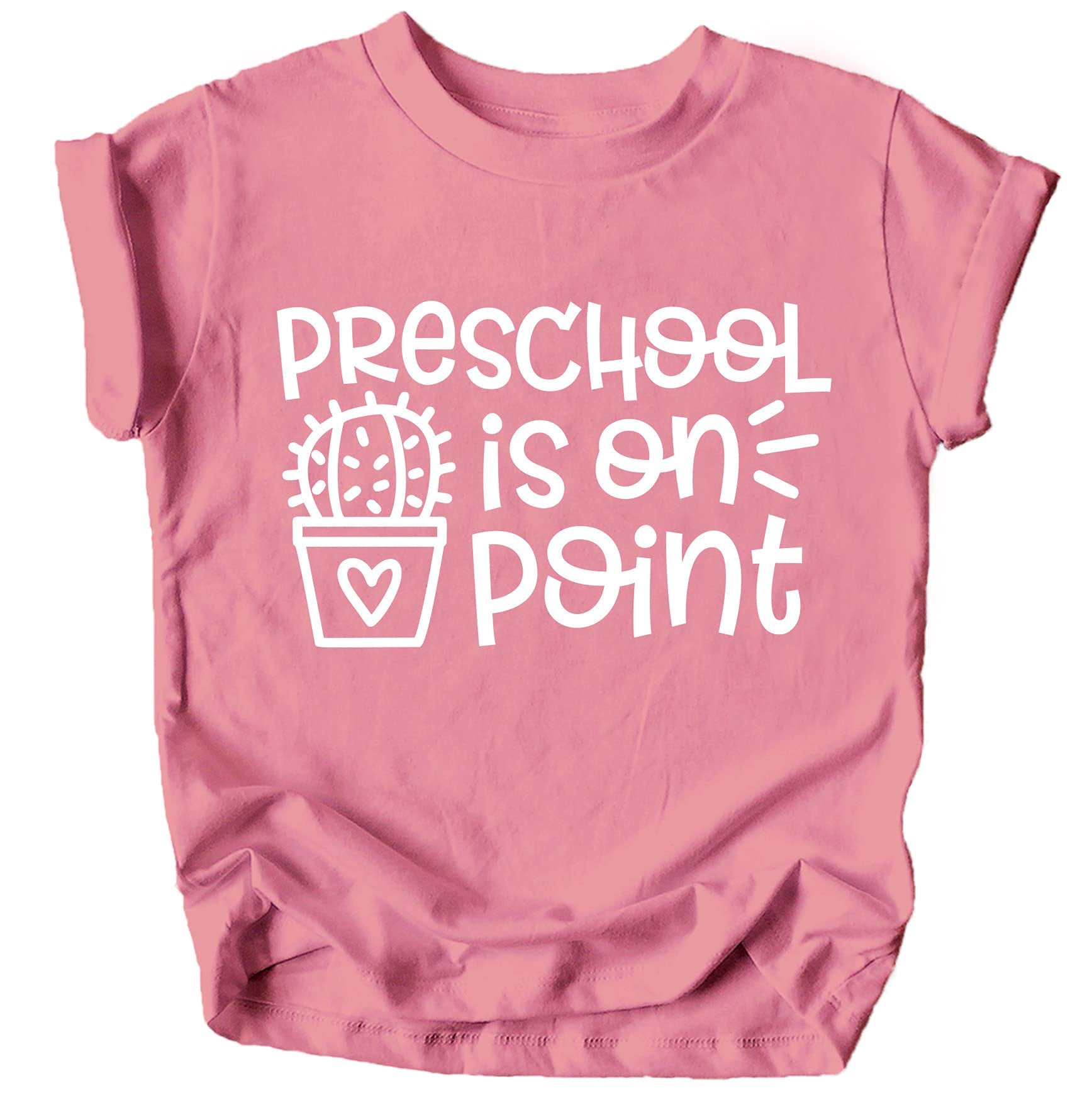 Flat lay of mauve toddler first day of school shirt with graphic design detail