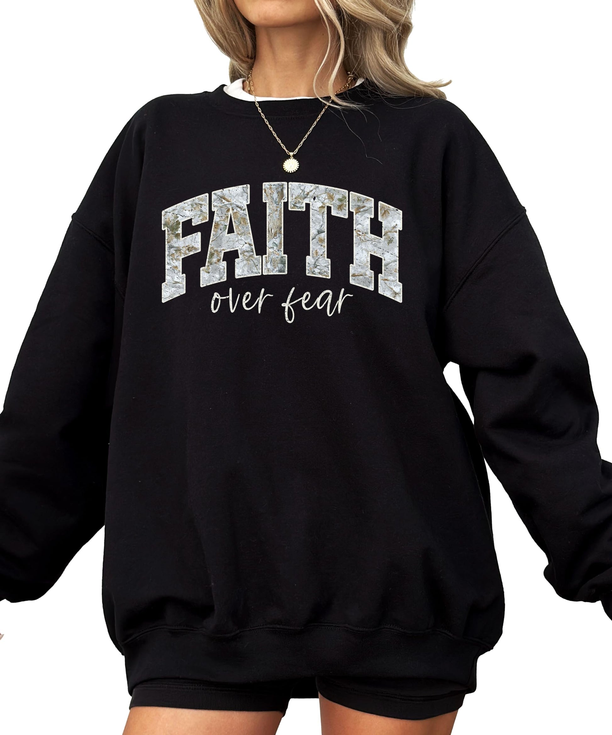 Front view of Faith Over Fear graphic sweatshirt in army green on model
