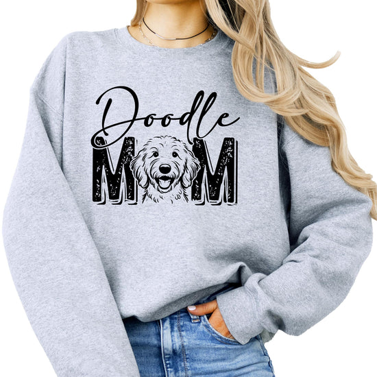 Close-up of Doodle Mom graphic print on gray sweatshirt showing print detail and quality