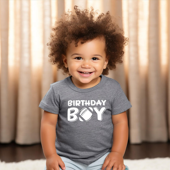 Football birthday shirt for boys laid flat showing full graphic design in granite heather